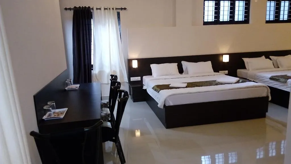 Alojamento de Acomodação e Pequeno-almoço Charles Premier Inn Thekkady